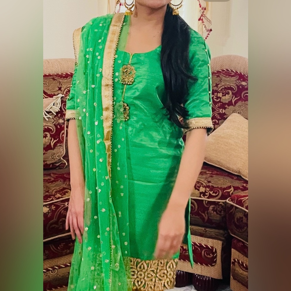 Bright green three piece Indian suit